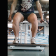 A girl records herself between the legs and behind her ass as she takes a shit and a piss into a public toilet at her gym after working out in 3 different scenes. 720P vertical format HD video. About 4 minutes.